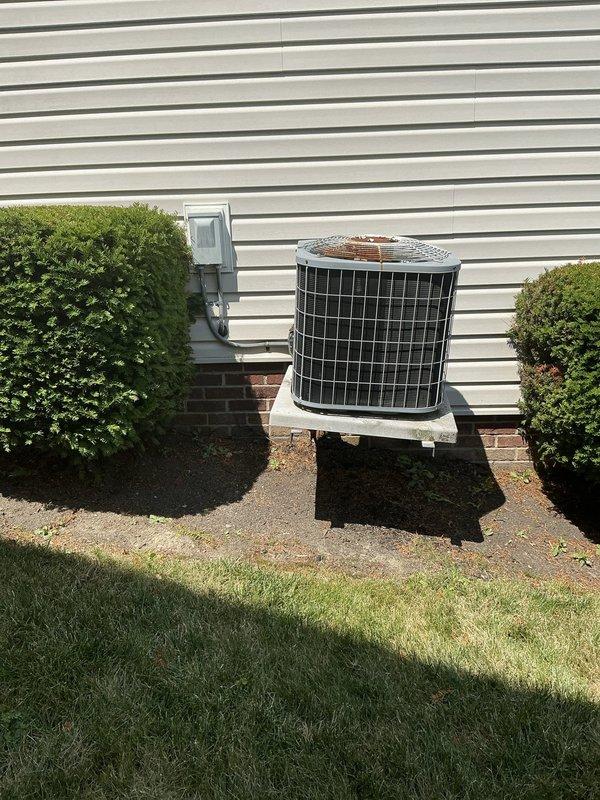 Conducted comprehensive assessment of aging residential HVAC system for full replacement options. Evaluated existing indoor air handler unit with condensate drainage system including PVC trap assembly and exterior AC condenser unit. Customer opted for complete system replacement due to age of equipment and breakdown on repairs, with installation scheduled for future appointment.