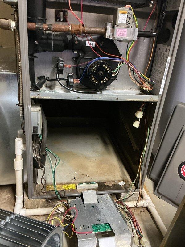 Replaced defective blower motor and wheel assembly in residential furnace unit. Removed old motor, installed new assembly, verified proper electrical connections, and tested system operation to ensure adequate airflow and performance.