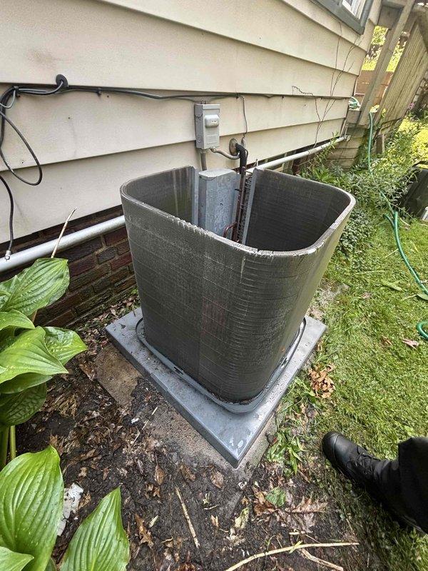 Performed comprehensive cleaning service on outdoor condensing unit that showed significant dirt and debris accumulation at base and throughout system. Removed and thoroughly cleaned blower wheel, performed detailed coil cleaning to restore heat transfer efficiency, and serviced feed tube. Unit exhibited heavy environmental contamination including sediment buildup, indicating extended exposure to outdoor elements. All components cleaned and restored to proper operating condition.