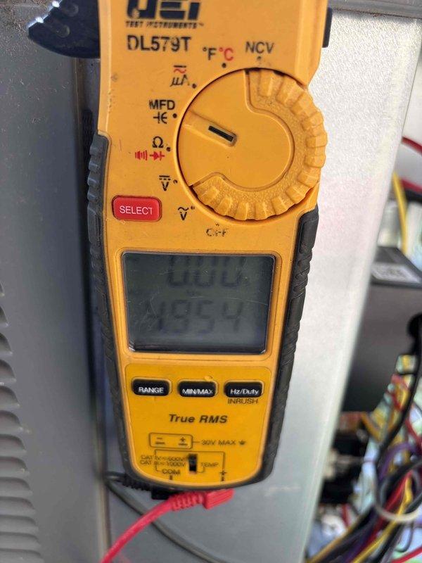 Completed comprehensive cooling system maintenance inspection. Performed electrical diagnostics using digital multimeter to verify proper voltage and capacitance readings at compressor and control components. Inspected all electrical connections, terminals, and wiring for secure contacts and proper operation, confirming system is functioning within manufacturer specifications.