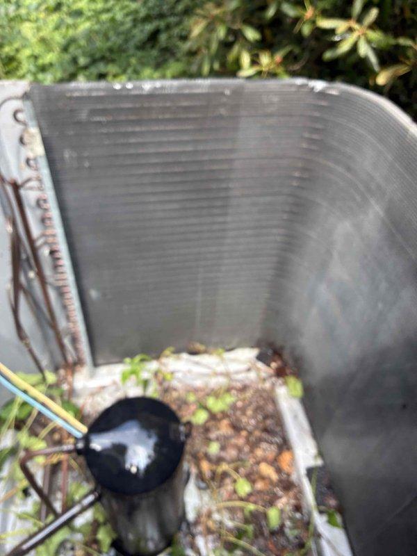 Responded to service call for thermostat connectivity issue with air conditioning system. Upon arrival, determined that customer's internet service had been interrupted over the weekend, causing Wi-Fi disconnection between thermostat and AC unit. Successfully reset thermostat and restored wireless connection to system after internet service was reestablished. During inspection, observed outdoor condenser unit with significant dirt and debris accumulation on coil fins, including leaves, organic matter, and soil buildup that could restrict airflow and reduce system efficiency if not addressed in future maintenance.