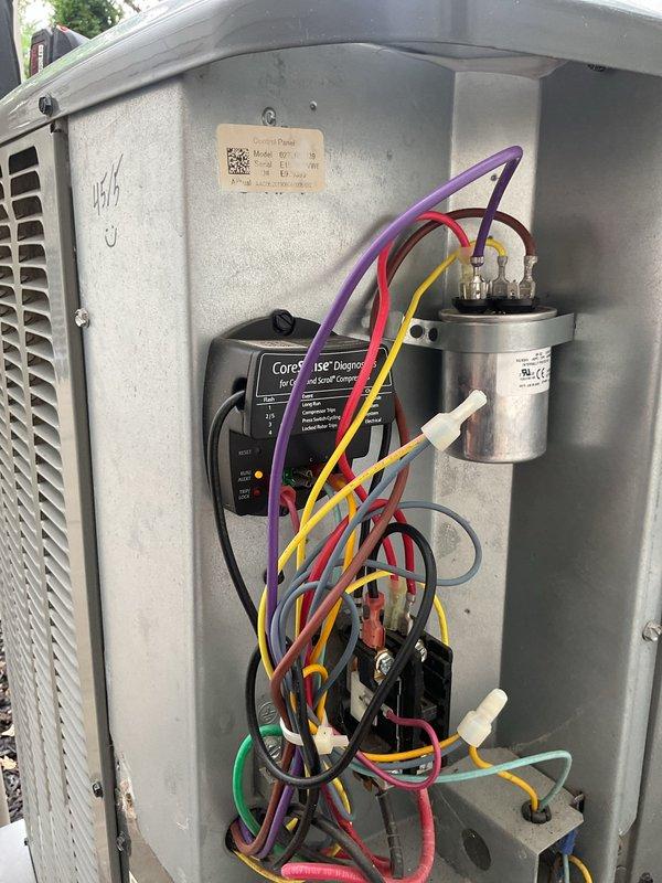 Performed comprehensive cooling system maintenance on residential HVAC unit. Accessed outdoor condensing unit and conducted thorough inspection of all electrical components including capacitor, contactor, and CoreSense diagnostic system. Verified proper wire connections across all terminals and confirmed operational status of all safety controls. Measured and documented system parameters using calibration-grade digital instrumentation, recording temperature differentials and verifying equipment performance within manufacturer specifications. All components found to be functioning properly with no immediate repairs required.