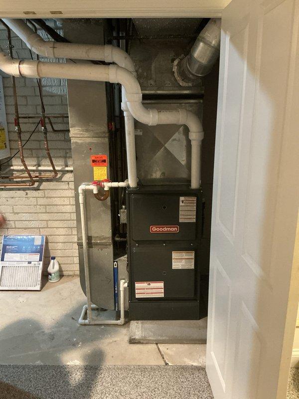 Performed diagnostic evaluation of existing Goodman furnace system and electrical service panel to provide replacement options. Inspected current HVAC equipment including furnace unit, PVC condensate drainage, ductwork configuration, and associated copper refrigerant lines. Evaluated electrical panel capacity and circuit breaker availability to determine compatibility with potential replacement equipment. Documented existing system specifications and installation conditions. Photographed equipment for replacement estimate preparation.