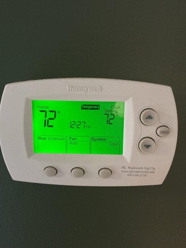 Responded to no cooling call affecting entire residence. Upon arrival, inspected Lennox furnace and air conditioning system located in basement mechanical room. Verified thermostat operation showing 72°F set point with system calling for cooling. Checked air filter condition and found filter accessible for inspection. System components including furnace, air handler, and associated PVC condensate drainage piping visually assessed for proper installation and connections. Thermostat displaying proper communication with HVAC equipment and responding to temperature adjustments in cooling mode.
