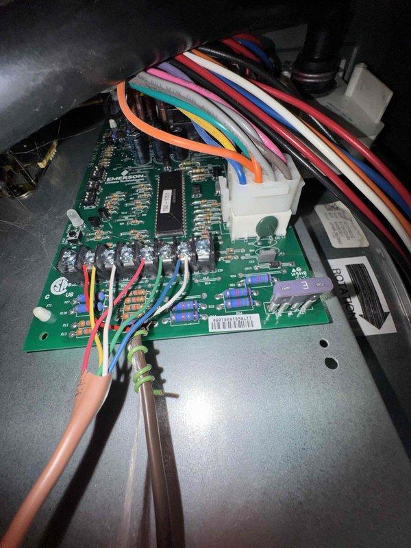 Performed comprehensive cooling system tune-up on residential HVAC unit. Conducted electrical diagnostics using clamp meter to verify amperage draw and system performance, inspected outdoor condenser unit including refrigerant lines and connections, and evaluated control board operation inside air handler. All components found operating within normal parameters and system ready for continued service.