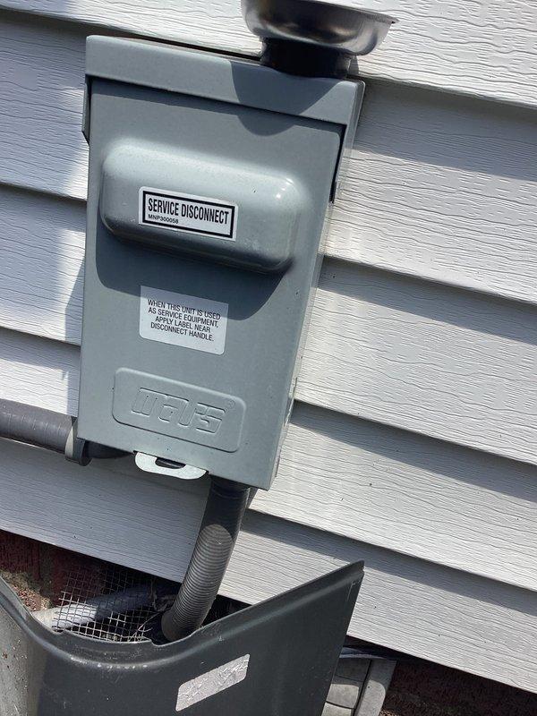 Completed routine HVAC cooling maintenance on residential system. Inspected and photographed exterior service disconnect box and fuse assembly, confirming proper electrical connections, verifying fuse ratings at 250V, and ensuring all safety components were functioning correctly. All equipment operational with no issues identified.