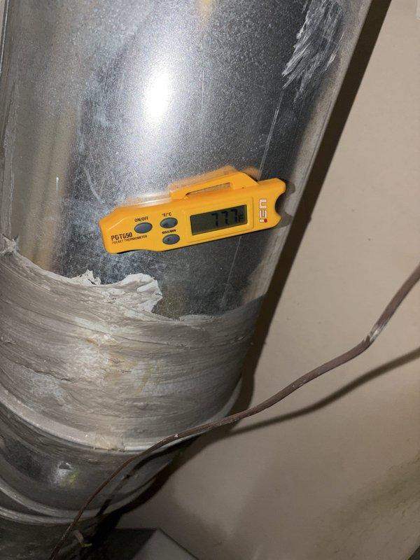Completed cooling season tune-up service on residential HVAC system. Performed system diagnostics including temperature differential measurements on supply ductwork using calibrated digital thermometer, confirming proper airflow and cooling performance. Noted significant dust accumulation on return air grille requiring attention for optimal system efficiency and indoor air quality.