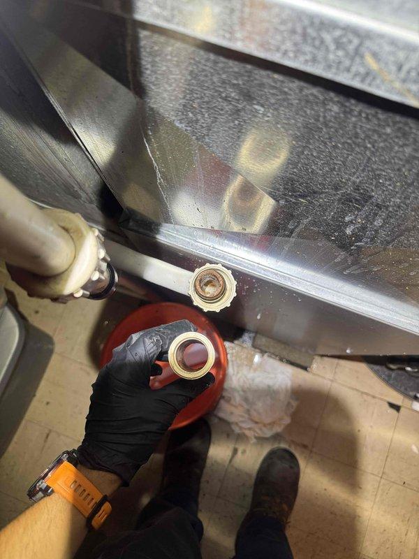 Responded to air conditioning water leak complaint. Inspected outdoor condenser unit and indoor evaporator system. Found condensate drain issue requiring attention. Performed diagnostic checks on drain pan and condensate removal system using appropriate tools and gauges. Addressed drainage concern to resolve water leak condition and restore proper system operation.