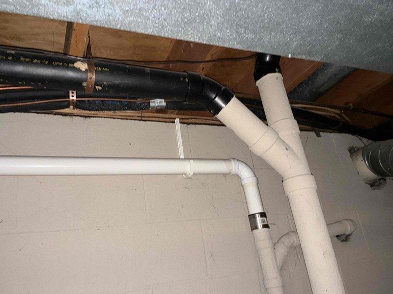 Completed comprehensive assessment of existing HVAC system for replacement options. Documented current equipment configuration including outdoor condensing unit with associated electrical disconnect, along with interior ductwork, plumbing connections, and structural considerations in ceiling space. Provided customer with multiple replacement system options and specifications for upgrading current air conditioning equipment.
