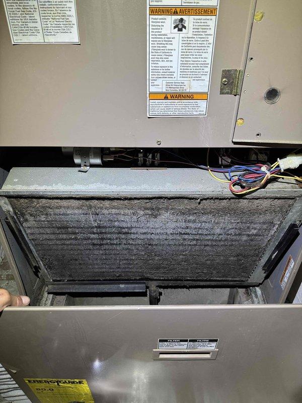 Performed HVAC service on a 15-year-old Magic Pack air conditioning system found to be low on refrigerant. Diagnosed refrigerant loss, inspected system components, and documented heavily soiled air filter requiring replacement. Customer advised to contact office for follow-up diagnostic information.