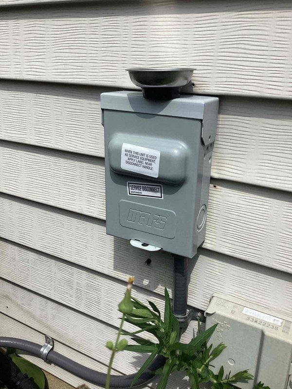 Completed routine HVAC cooling system maintenance including temperature diagnostics and system performance verification. Supply air temperature measured at 55°F at the ductwork, confirming proper cooling operation. Inspected exterior disconnect and electrical service components to ensure safe system operation.