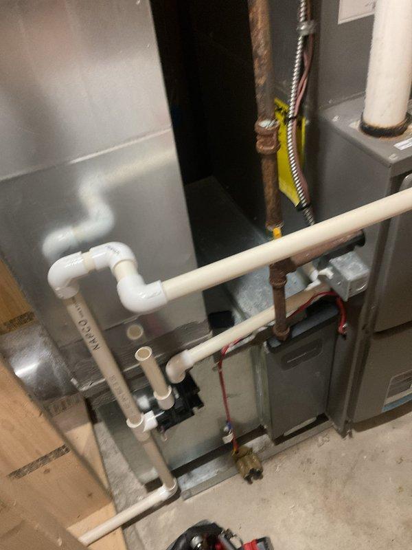 Performed comprehensive air conditioning tune-up on Lennox condensing unit model C35-24B-2F-20 as part of scheduled maintenance plan. Conducted complete system inspection including refrigerant charge verification, electrical connections, condenser coil cleaning, and operational testing of all components. System found operating within manufacturer specifications with no deficiencies noted; confirmed proper drainage through condensate system and verified all safety controls functioning correctly.
