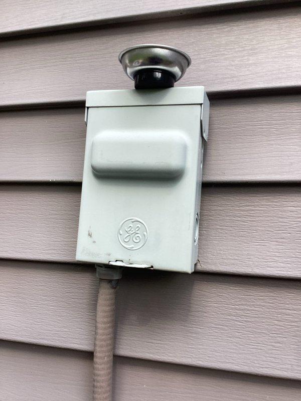 Completed cooling system tune-up maintenance on residential HVAC unit. Performed standard diagnostic testing including electrical measurements at the outdoor disconnect, verified proper amperage draws on compressor and condenser fan motor, and confirmed system operational parameters were within manufacturer specifications.