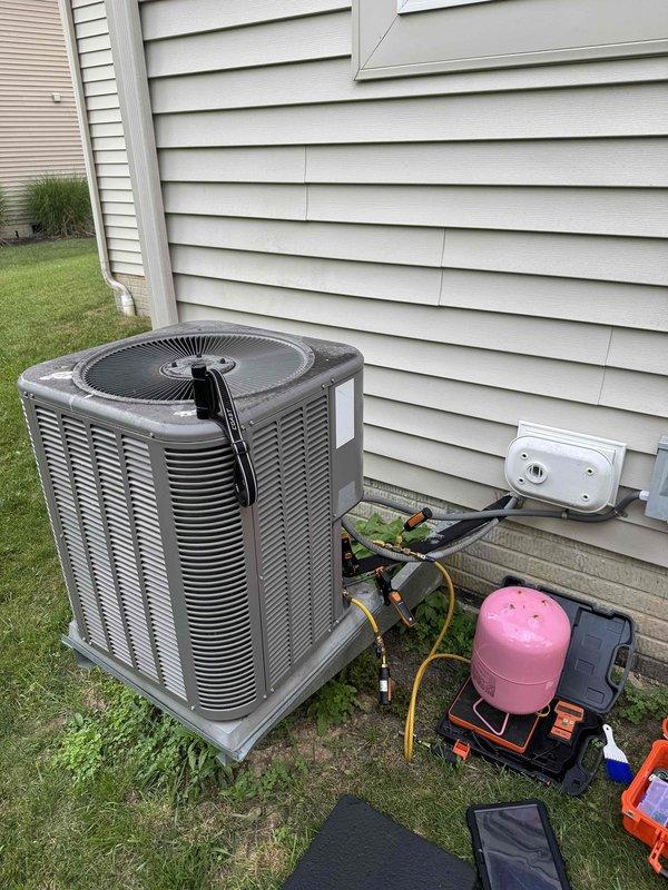 Responded to service call for air conditioning system not maintaining set point during high ambient temperatures. Upon arrival, performed comprehensive system evaluation including refrigerant charge assessment using digital manifold gauges and recovery equipment. System was found to be low on refrigerant charge. Added refrigerant to manufacturer specifications to restore proper cooling capacity. Verified system operation and proper temperature differential across evaporator coil. Unit cycling properly and maintaining desired indoor temperature upon completion.
