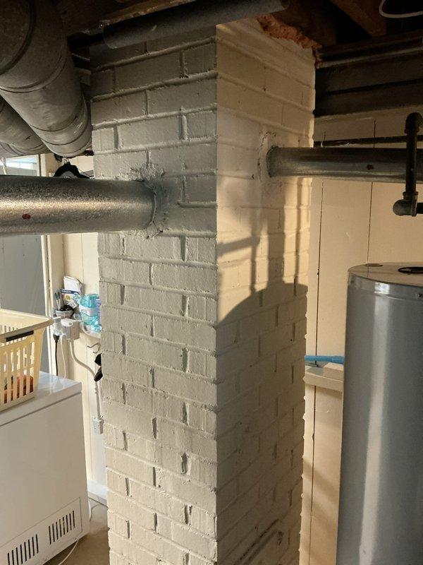 Conducted full system replacement estimate for aging HVAC system with customer expressing interest in Trane equipment options. Evaluated existing basement installation featuring accessible ductwork configuration and straightforward equipment placement near utility area with water heater, confirming favorable conditions for replacement work with minimal structural modifications required.