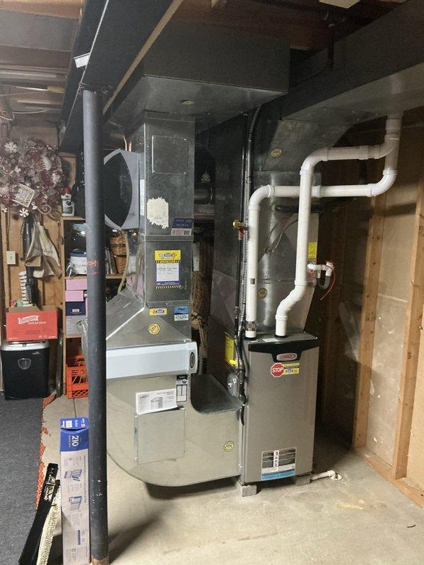 Provided estimate for replacement of leaking evaporator coil on 10-year-old Lennox cooling system. The existing Lennox furnace is 2 years old with 96% efficiency and in good operating condition, requiring only the cooling system components to be addressed. Documented existing equipment configuration and discussed replacement options with homeowner.