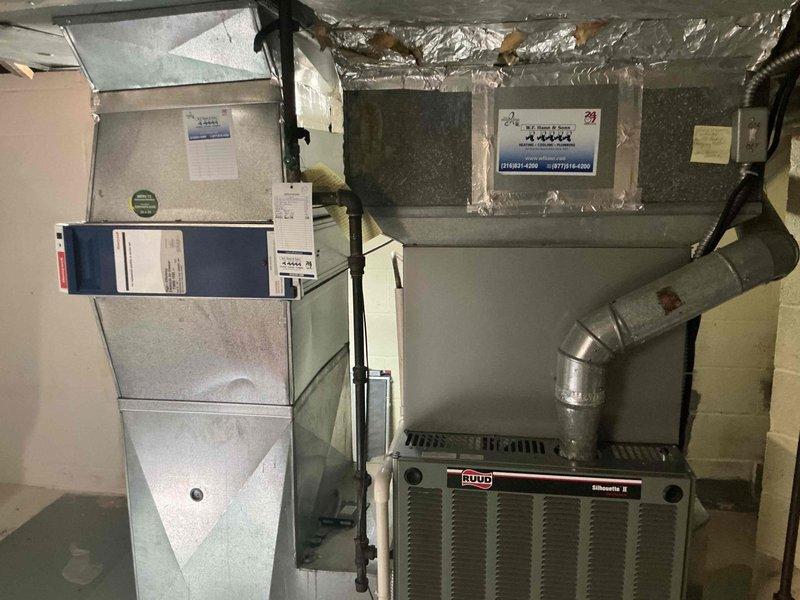 Conducted estimate visit for complete HVAC system replacement at residential property. Assessed existing 27-year-old air conditioning unit and Ruud furnace system located in basement, both of which have reached end of service life. Documented current equipment configuration including ductwork layout, air handler placement, and existing installation setup through photographic documentation. Provided comprehensive replacement quote for new air conditioning and furnace system to address failed cooling equipment and aging heating components.