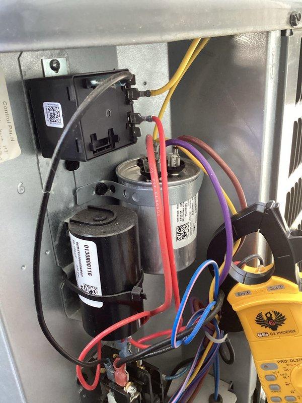 # HVAC Cooling Maintenance Summary

Performed routine cooling system maintenance including inspection of electrical components and safety devices. Examined and tested dual fuses in the disconnect assembly, verifying proper amperage ratings and electrical continuity. Conducted comprehensive electrical diagnostics using digital multimeter to measure voltage and current at capacitor terminals and control module connections. Inspected run capacitor and start components for proper operation, checking all wire connections including control wiring throughout the system. All safety devices, electrical connections, and components found to be functioning within manufacturer specifications. System operational and ready for continued service.