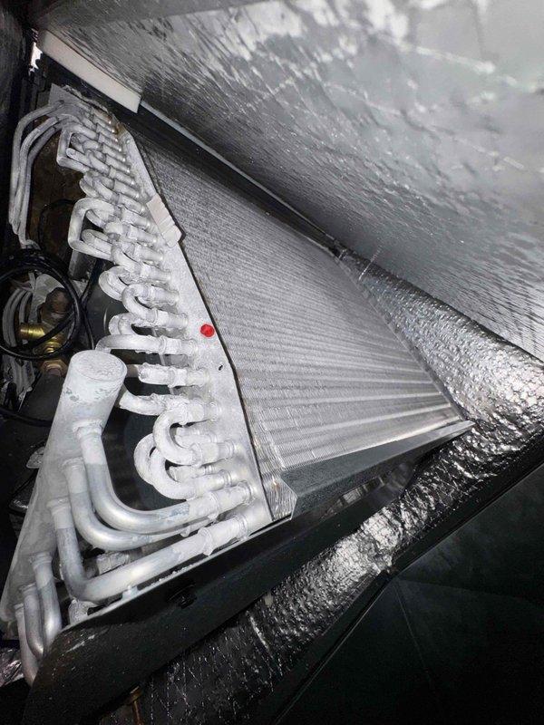 Responded to no cooling complaint on upstairs unit. Upon inspection, found evaporator coil with heavy frost and ice buildup on refrigerant lines, indicating a system malfunction. Diagnosed frozen coil condition and collected service fee for diagnostic visit.