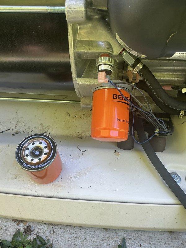 Responded to generator displaying yellow warning light. Performed routine maintenance including oil and filter change on Generac unit. Conducted battery system analysis using diagnostic equipment, confirming battery health at 100% with all parameters reading within normal operating specifications. Unit tested and returned to normal operating status with warning light cleared.