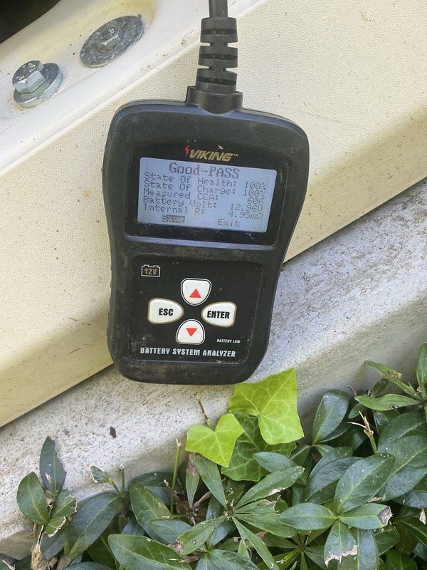 Responded to generator displaying yellow warning light. Performed routine maintenance including oil and filter change on Generac unit. Conducted battery system analysis using diagnostic equipment, confirming battery health at 100% with all parameters reading within normal operating specifications. Unit tested and returned to normal operating status with warning light cleared.