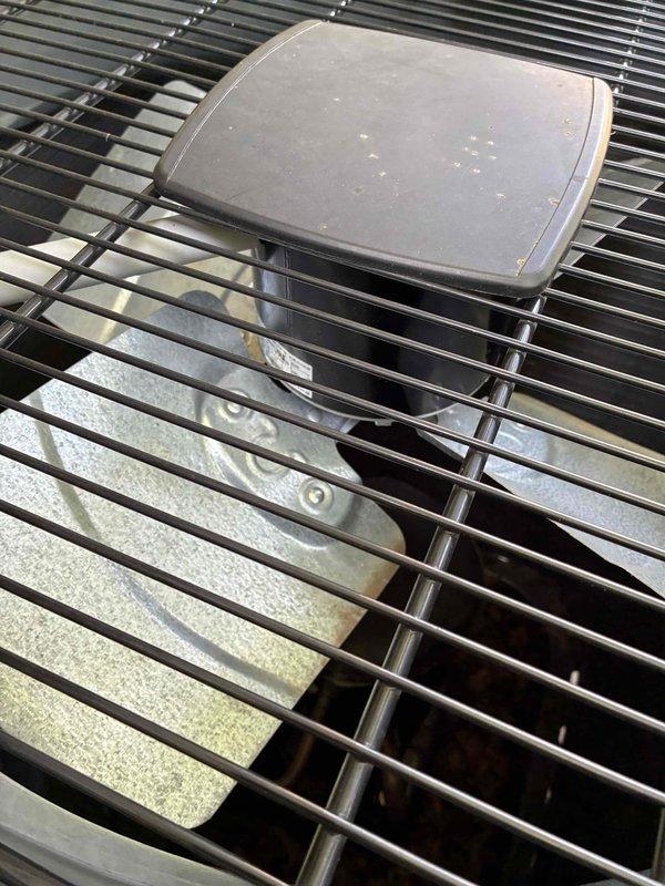 Returned to complete condenser fan motor and capacitor replacement on outdoor HVAC unit. Successfully installed new motor assembly and dual run capacitor, restoring proper system operation and airflow.