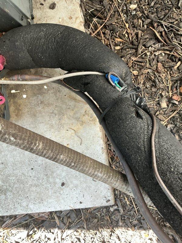 Performed routine HVAC cooling system maintenance on residential unit. Inspected outdoor condenser components, flexible ductwork connections, and backup generator system to ensure proper operation and identify any potential issues. All equipment found to be functioning within normal parameters with no immediate repairs required.