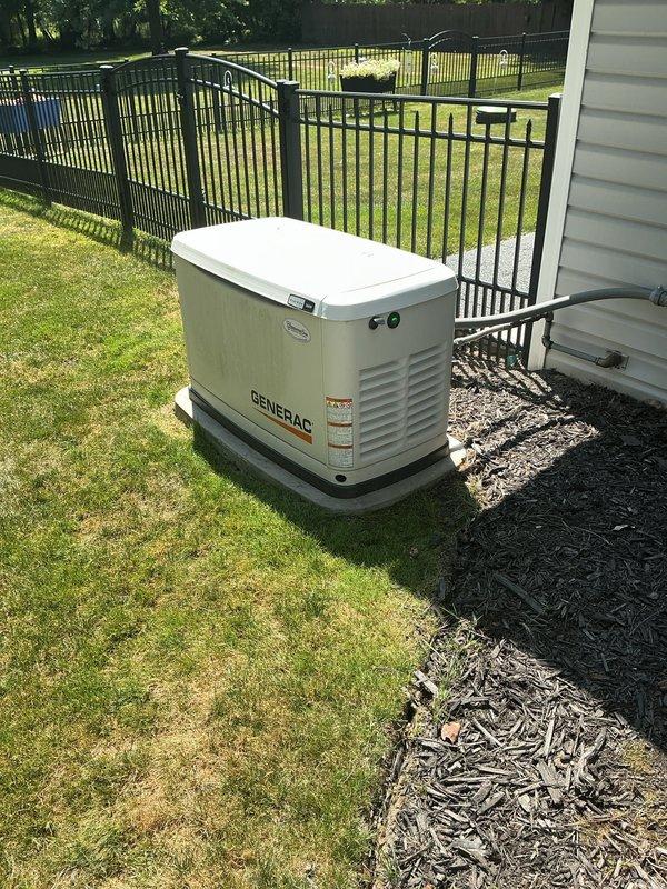Performed routine HVAC cooling system maintenance on residential unit. Inspected outdoor condenser components, flexible ductwork connections, and backup generator system to ensure proper operation and identify any potential issues. All equipment found to be functioning within normal parameters with no immediate repairs required.