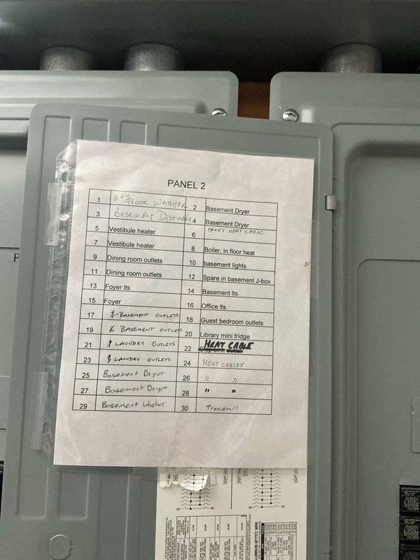 Responded to service call for damaged outdoor outlet and sauna electrical service requirements. Conducted site assessment and documented existing electrical panel configuration and basement utility area conditions. Inspected Panel 2 circuit directory showing multiple branch circuits serving various loads including laundry equipment, basement outlets, heating cables, and general lighting circuits. Evaluated unfinished basement space with exposed joists, existing electrical conduit runs, and mechanical infrastructure to determine feasibility for additional sauna circuit installation and outdoor outlet repair work.