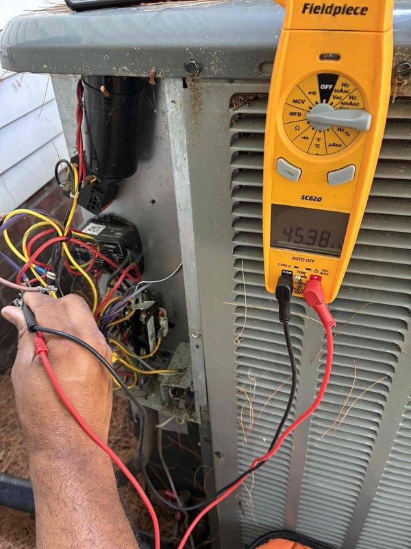 Completed scheduled cooling system maintenance on outdoor condensing unit. Performed electrical diagnostics using digital multimeter to verify proper voltage and amperage readings across system components. Inspected and tested capacitor, control board connections, and all electrical wiring for proper operation. All readings within manufacturer specifications. Unit operating normally with no deficiencies noted.