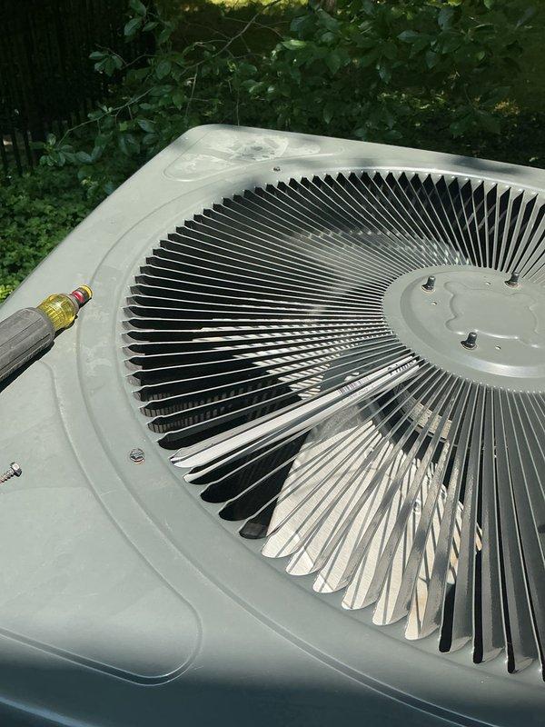 # HVAC Cooling Maintenance Service

Completed comprehensive preventive maintenance on residential cooling system as part of ongoing service plan. Performed thorough inspection and cleaning of outdoor condenser unit, including coil cleaning with professional-grade solution to remove accumulated debris and restore optimal heat transfer efficiency. Verified proper operation of condenser fan motor and assessed overall unit condition. Conducted interior inspection of water heater and associated plumbing connections to ensure integrated system functionality and identify any potential concerns affecting overall HVAC performance.