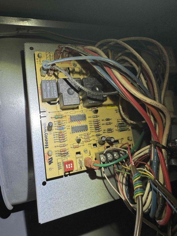 Responded to service call for air conditioning unit with reported filter installation issues. Upon inspection, accessed blower assembly and control board to diagnose airflow obstruction preventing proper filter placement. Cleared debris from squirrel cage blower wheel and verified control board connections and relay functionality to ensure system operational integrity.