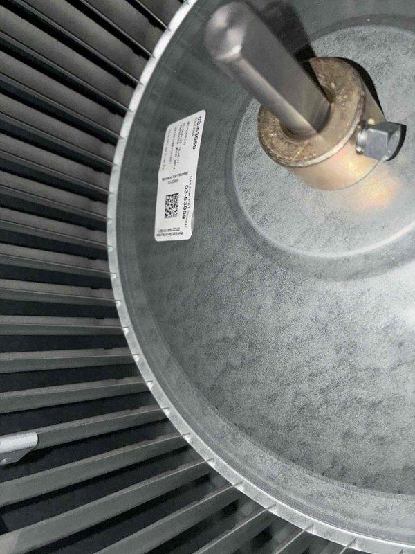 Completed scheduled cooling season preventive maintenance on residential air conditioning system. Performed comprehensive inspection of outdoor condensing unit, including visual assessment of fan assembly, motor components, and protective housing. Verified proper operation of condenser fan motor and blades, confirmed equipment labeling and identification tags present and legible, and documented overall system condition with photographic records showing unit in operational status with normal dust accumulation typical of seasonal use.