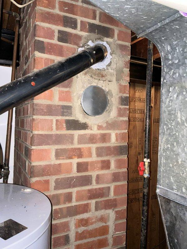 Responded to no cooling complaint and performed comprehensive system evaluation. Upon inspection, determined existing HVAC equipment had failed beyond economical repair. Documented current installation including basement-mounted air handler, ductwork configuration, and exterior venting components. Provided customer with complete system replacement options and specifications for new equipment installation to restore cooling capacity.