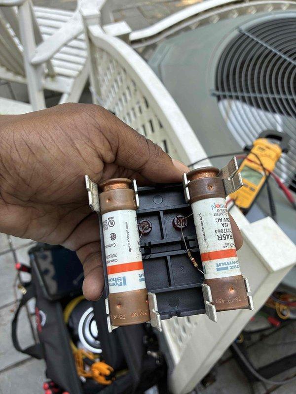 Completed seasonal cooling tune-up on rooftop HVAC unit. Inspected and tested electrical components including fuses and dual-run capacitor, verified proper amperage ratings and connections, and confirmed all safety controls operational. System tested and running within manufacturer specifications.
