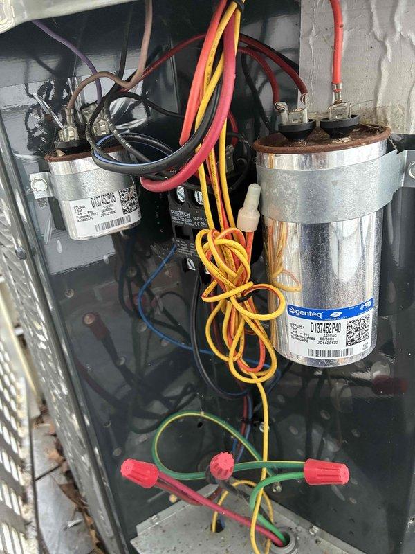 Completed seasonal cooling tune-up on rooftop HVAC unit. Inspected and tested electrical components including fuses and dual-run capacitor, verified proper amperage ratings and connections, and confirmed all safety controls operational. System tested and running within manufacturer specifications.