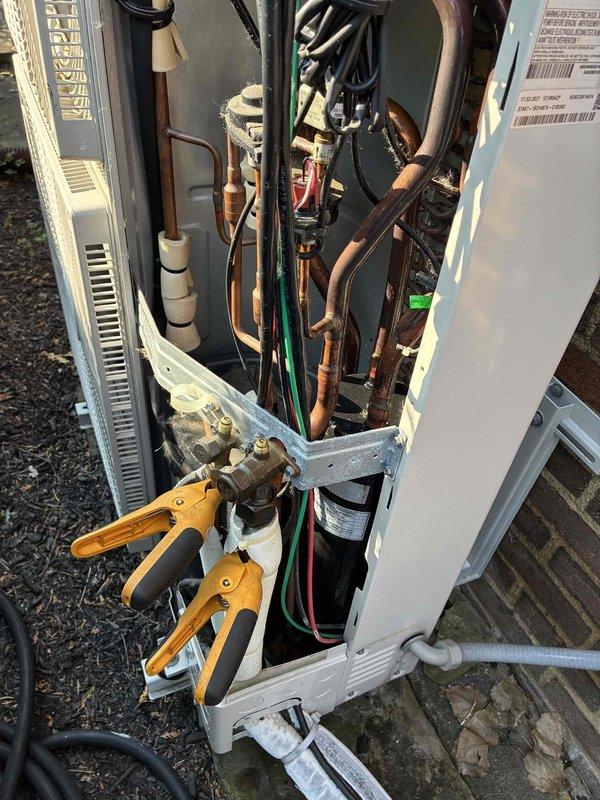 Completed comprehensive cooling season tune-up on dual HVAC system. Performed full system diagnostics with manifold gauges to verify refrigerant charge levels and pressures on both outdoor condensing units. Inspected all copper refrigerant lines, electrical connections, and drainage systems for proper operation and wear. All components found to be functioning within manufacturer specifications with no deficiencies noted.
