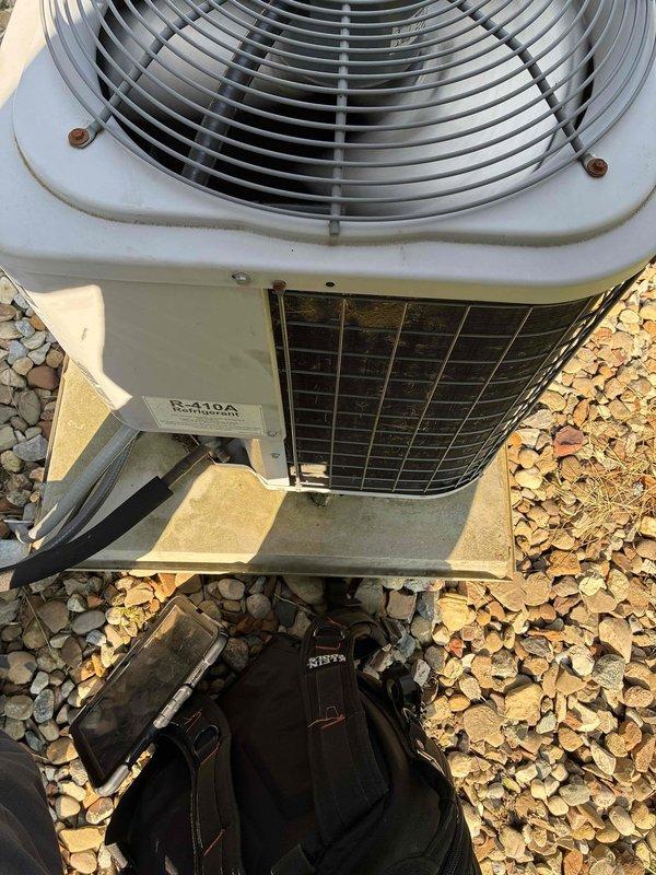 Completed scheduled preventive maintenance on residential R-410A cooling system. Performed comprehensive inspection of outdoor condensing unit including electrical connections, contactor assembly, and refrigerant line set. All components found operating within normal parameters, connections secure, and unit functioning properly for continued seasonal operation.