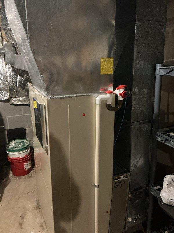 Completed cooling season tune-up on residential HVAC system located in basement mechanical room. Performed comprehensive inspection of furnace/air handler unit, verified proper operation of all components, checked refrigerant levels, cleaned condensate drain system, inspected ductwork connections for air leaks, and confirmed all safety controls functioning properly. System operating within normal parameters with no issues identified.