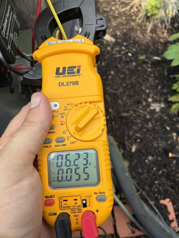 Performed comprehensive cooling maintenance and tune-up on 7-year-old Amana HVAC system. Conducted thorough inspection of outdoor condensing unit, cleaned exterior surfaces showing algae growth and dirt accumulation, and verified proper operation of all electrical components using digital multimeter to measure voltage, amperage, and capacitance readings. All system parameters tested within manufacturer specifications, refrigerant lines inspected and confirmed secure, and unit returned to optimal operating condition for continued reliable performance.