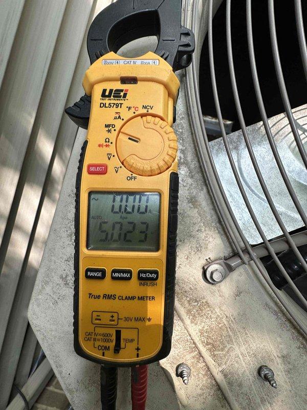 Completed routine cooling system tune-up and maintenance inspection on HVAC unit. Performed electrical diagnostics including amp draw measurements using clamp meter, verified proper electrical connections at terminal block, and confirmed all components operating within normal parameters.