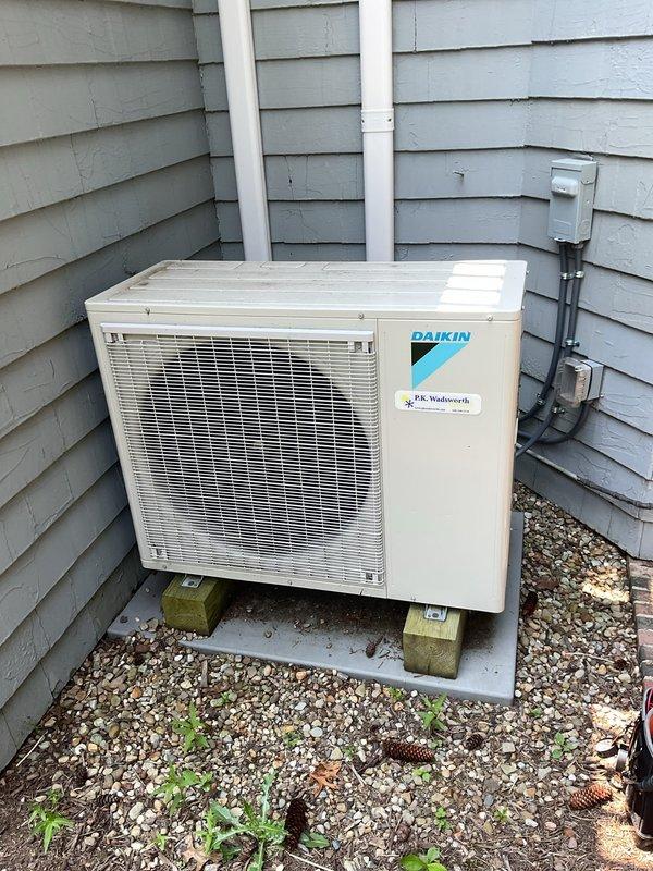 Performed comprehensive preventive maintenance on a five-year-old Daikin mini split system. Inspected outdoor condenser unit, accessing internal components to examine refrigerant lines, service valves, and electrical connections. All copper refrigerant piping, insulated line sets, and valve fittings found in satisfactory condition with no visible leaks or damage. Verified proper installation of unit on concrete pad with adequate clearance. Checked condenser coils through protective grille, confirmed electrical disconnect box accessible and secure. System operating as expected with no issues identified during inspection. Confirmed contact information on file and scheduled next maintenance for 2026.