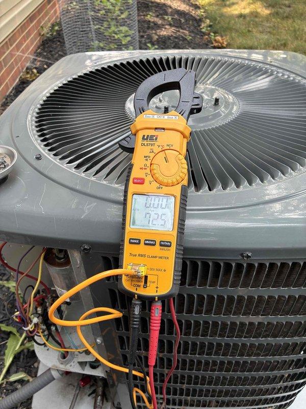 # HVAC Cooling Maintenance Summary

Completed routine preventive maintenance on residential air conditioning system as part of ongoing service agreement. Performed comprehensive electrical diagnostics using digital clamp meter, measuring compressor amperage at 14.00 amps and recording system voltage at 71.25 volts to verify proper electrical operation.

# Detailed Work Performed

Conducted thorough inspection and testing of outdoor condensing unit. Verified proper operation of contactor relay and examined all electrical connections including line voltage wiring and control circuits. Inspected compressor electrical connections, capacitor wiring, and multi-phase power distribution to all major components.

Measured operating amperage of compressor to ensure unit is drawing within manufacturer specifications, indicating proper refrigerant charge and mechanical operation. Documented voltage readings to confirm adequate power supply to the system. Examined condenser coil condition and noted