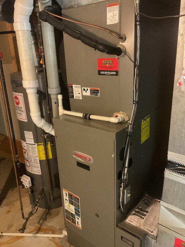 Completed scheduled cooling maintenance on Lennox HVAC system. Performed comprehensive inspection of furnace unit, verified all safety labels and operational specifications, checked ductwork connections and seals, and confirmed proper equipment function. Supply air temperature measured at 52.8°F, indicating system operating within normal parameters for cooling mode.