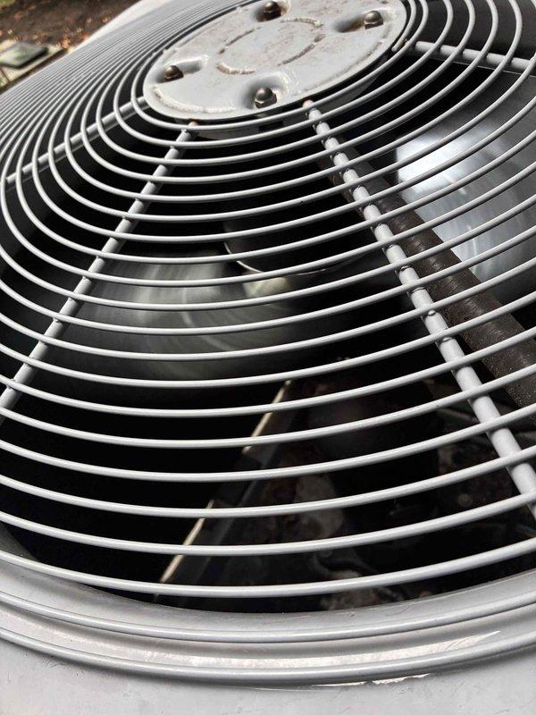 Returned to site to complete condenser fan motor and blade replacement on outdoor HVAC unit. Installed new motor assembly and fan blade, secured components with proper mounting hardware, and verified electrical connections. Tested unit operation with digital multimeter to confirm proper amperage draw and system functionality.