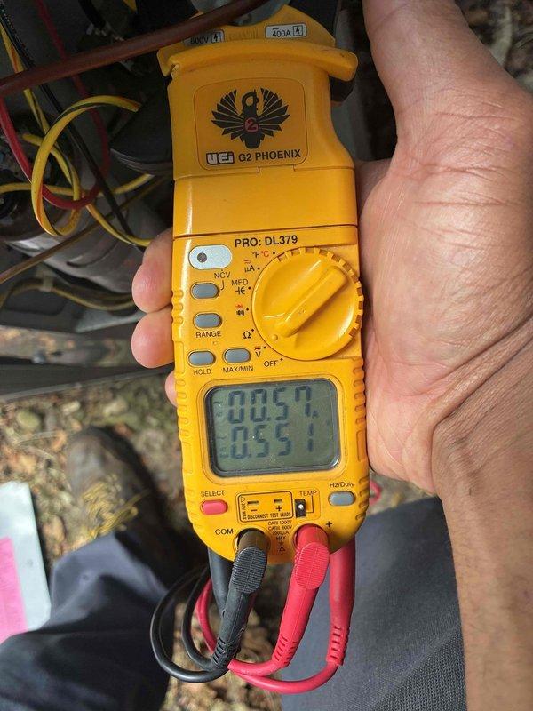 Returned to site to complete condenser fan motor and blade replacement on outdoor HVAC unit. Installed new motor assembly and fan blade, secured components with proper mounting hardware, and verified electrical connections. Tested unit operation with digital multimeter to confirm proper amperage draw and system functionality.