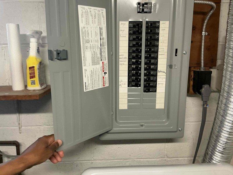 Conducted comprehensive assessment of 23-year-old residential HVAC system for replacement estimate, including outdoor air conditioning unit and basement furnace installation. Performed detailed evaluation of existing electrical panel and circuit capacity to determine infrastructure requirements for new equipment installation. Documented current ductwork configuration and measured spatial dimensions for proper equipment sizing and replacement planning.