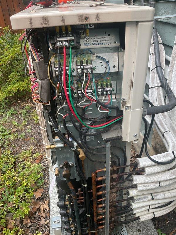 Completed cooling tune-up on multi-zone Mitsubishi Electric heat pump system consisting of 2 outdoor condensing units serving 9 total indoor air handlers. Inspected both outdoor units, verified proper operation of electrical contactors and relays, checked refrigerant line connections, and confirmed all components functioning within normal parameters.