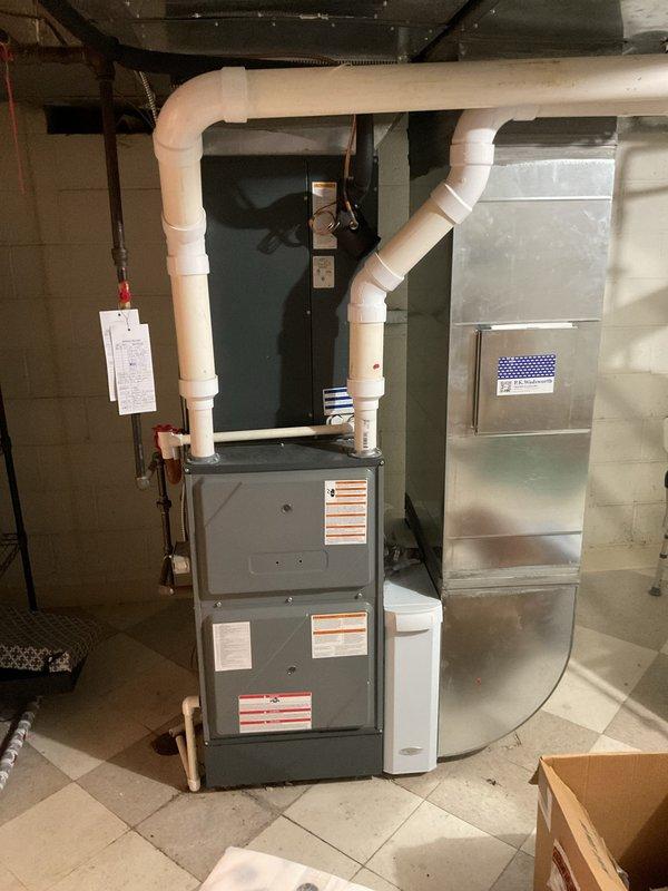 Conducted on-site evaluation of existing 10-year-old furnace system to provide estimate for air purification equipment installation in response to anticipated future smoke concerns. Assessed current HVAC configuration, including furnace unit, ductwork plenum, and venting system to determine compatibility and optimal placement for IAQ enhancement equipment. Documented existing system specifications and captured photos of mechanical room layout to develop comprehensive air purification solution proposal.
