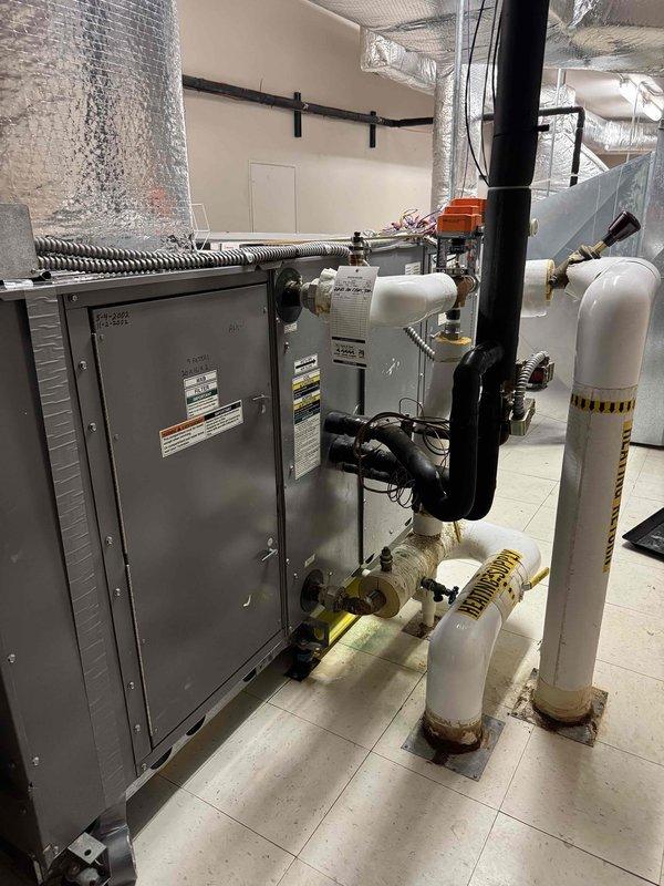 Responded to service call for excessive water leakage from industrial air conditioning units in church attic causing discharge into building below. Upon inspection, identified blocked condensate drain lines on 11-year-old AC system as primary cause of water intrusion. Cleared obstructed drain lines, verified proper drainage flow, and tested system operation to ensure condensate was being properly evacuated from units without further leakage into occupied space below.
